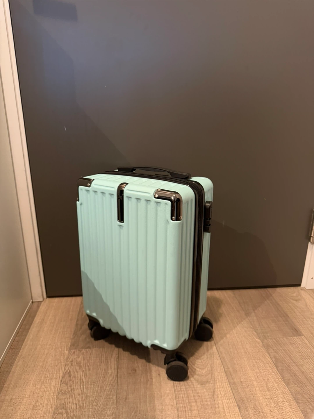 Mint green small suitcase
