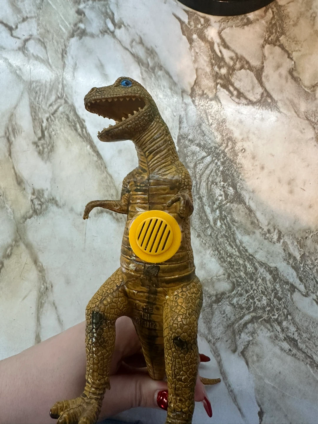 Toy Dinosaur with Yellow Speaker