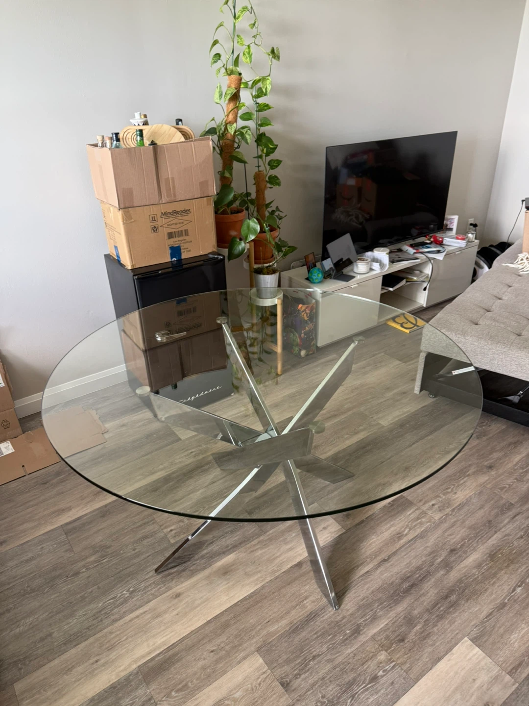 Round Glass Dining Table with Starburst Base