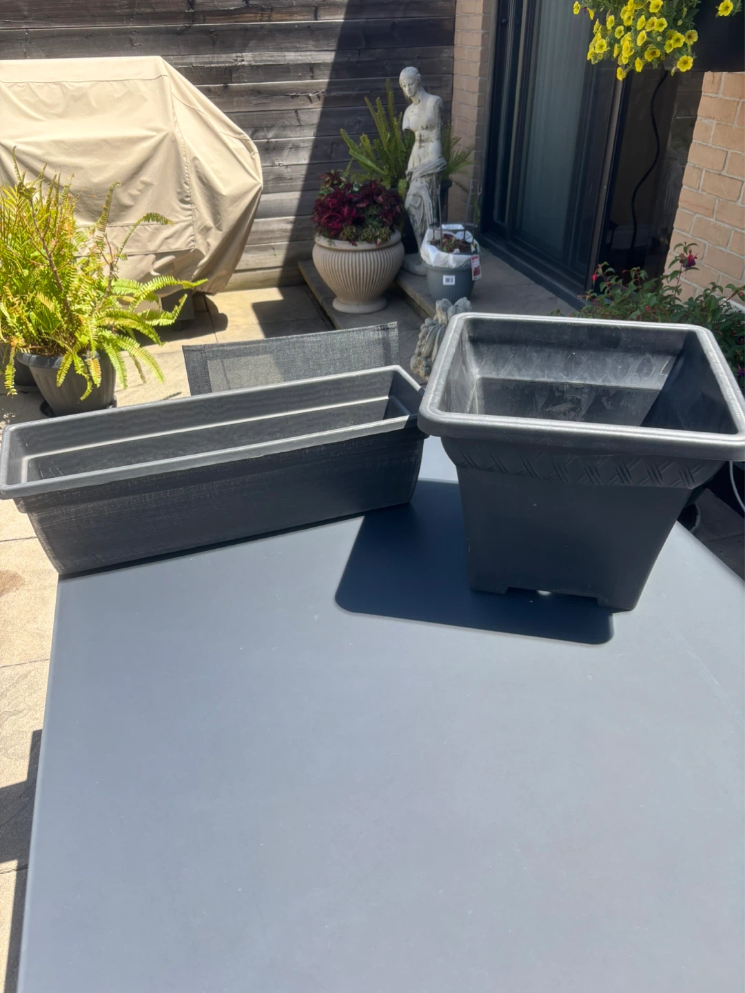 2 Black Plastic Planter pots