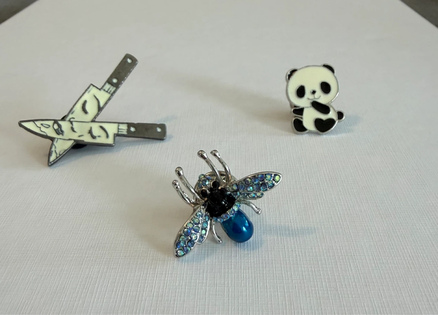 Lot of Enamel Pins - Bee, Panda, and Crying Knives - photo 2
