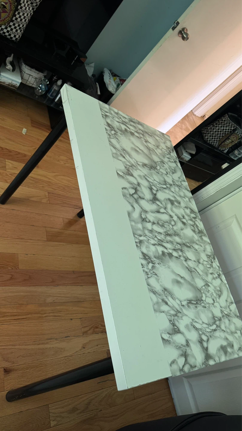 Marble top side table with black legs