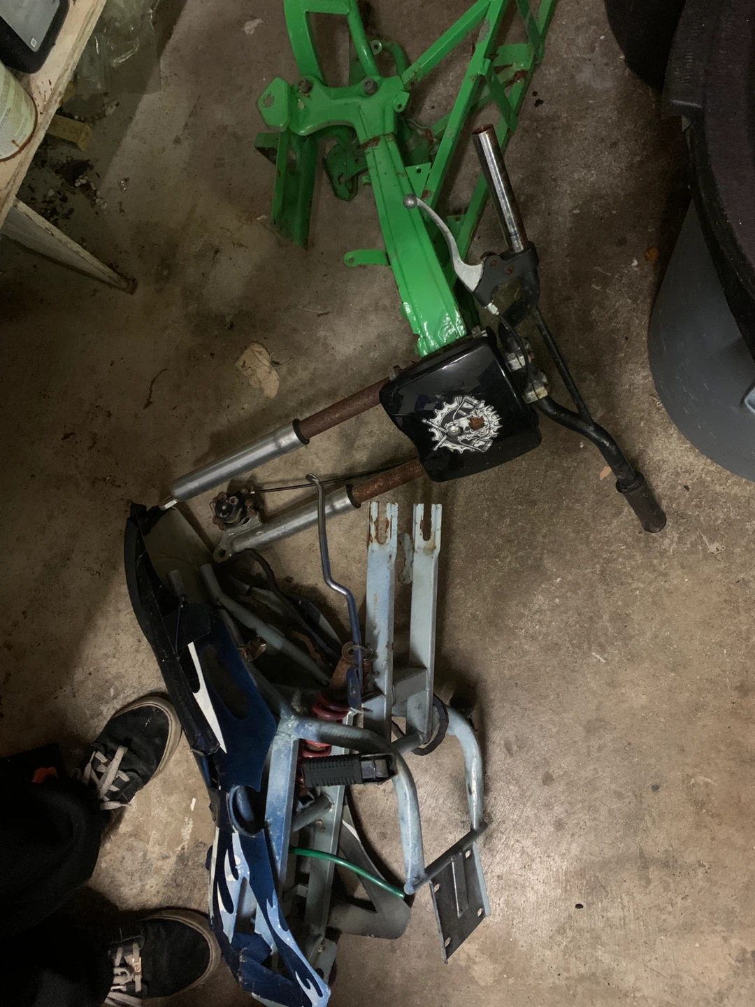 Green Motorcycle Frame and Parts