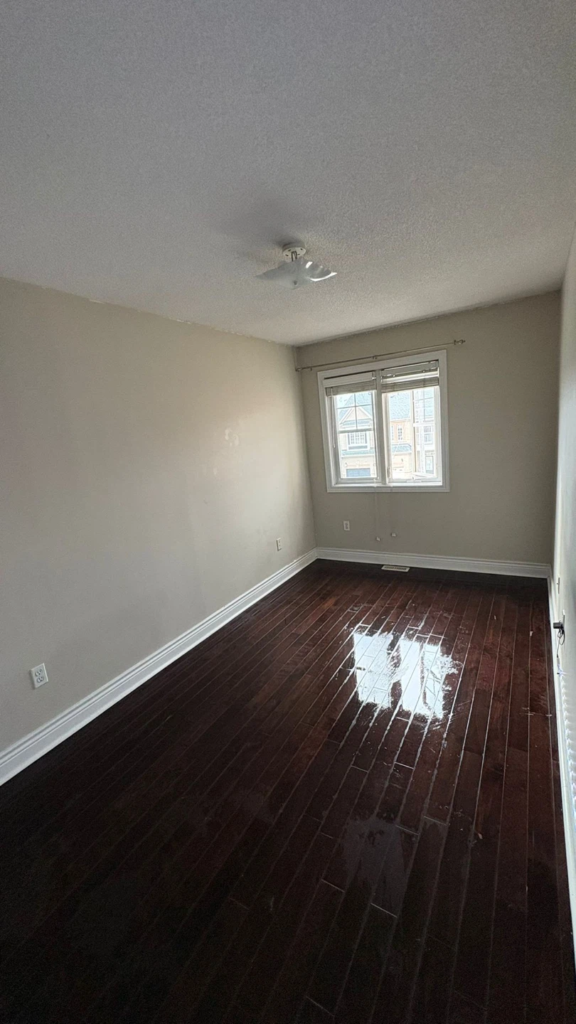 Empty Bedroom with Hardwood Floors