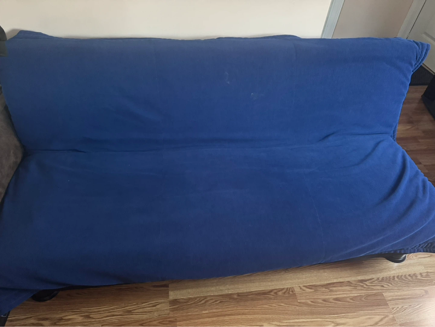Futon with blue cover