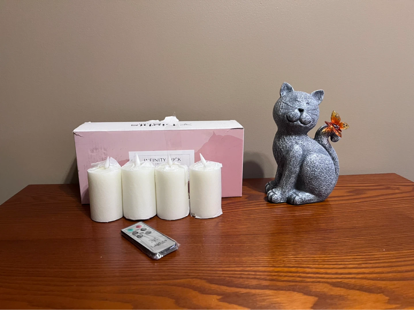 FLAMELESS VOTIVE CANDLES & CAT SOLAR STATUE
