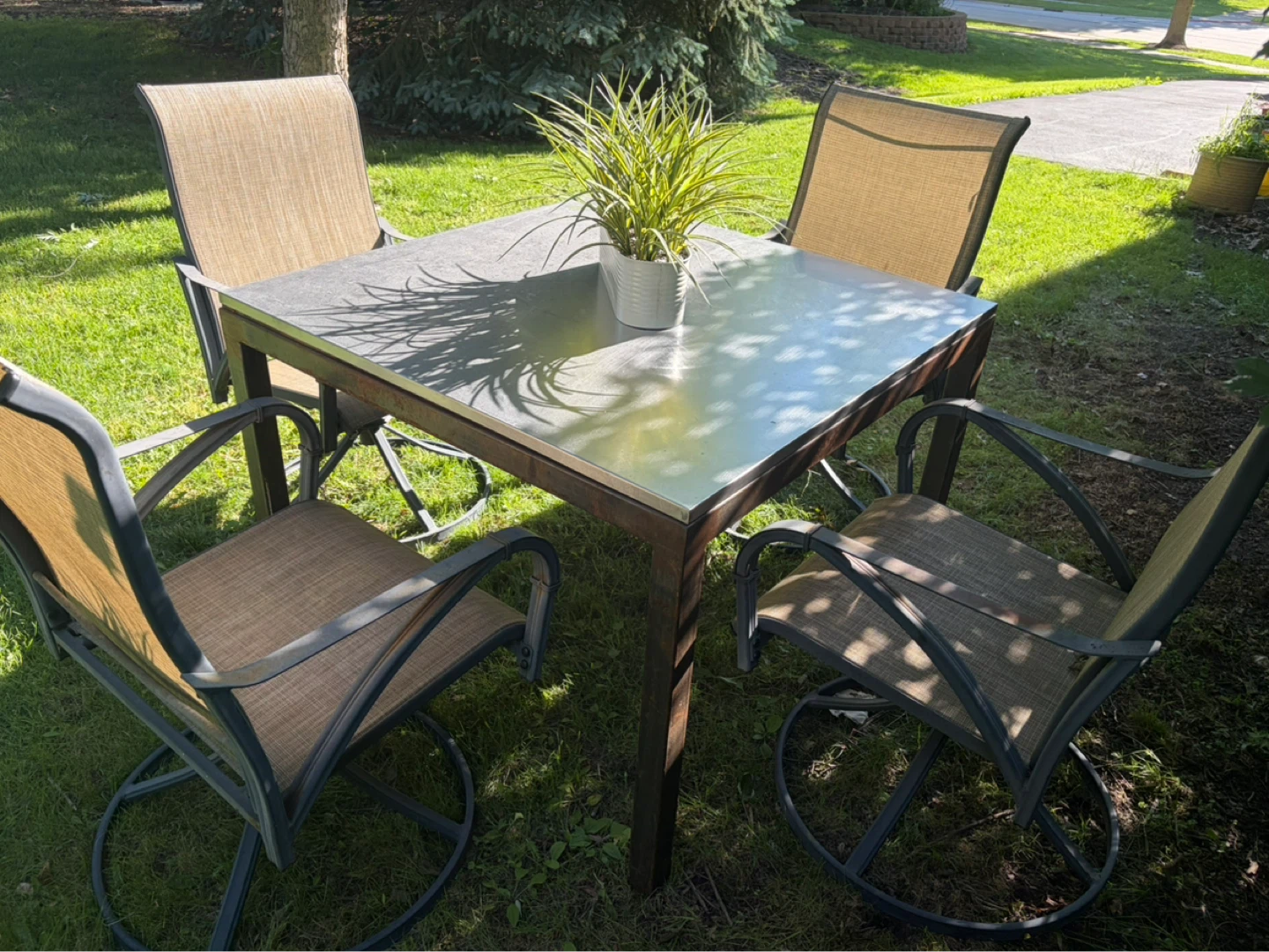 Patio set with swivel chairs