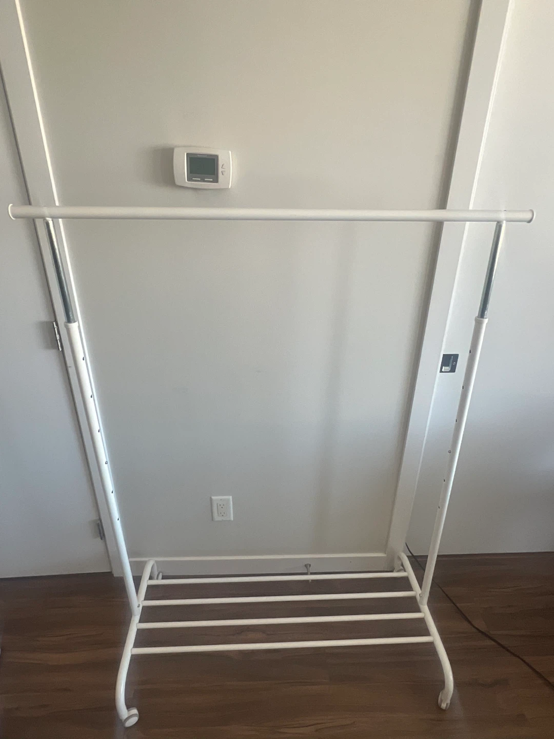 White Rolling Clothes Rack with Shelf