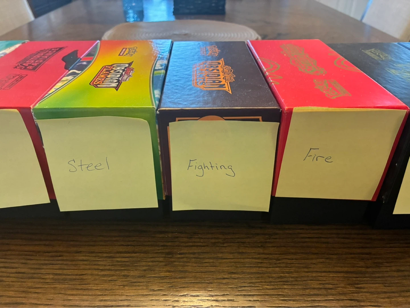 Pokémon ETB boxes with various common cards - photo 5
