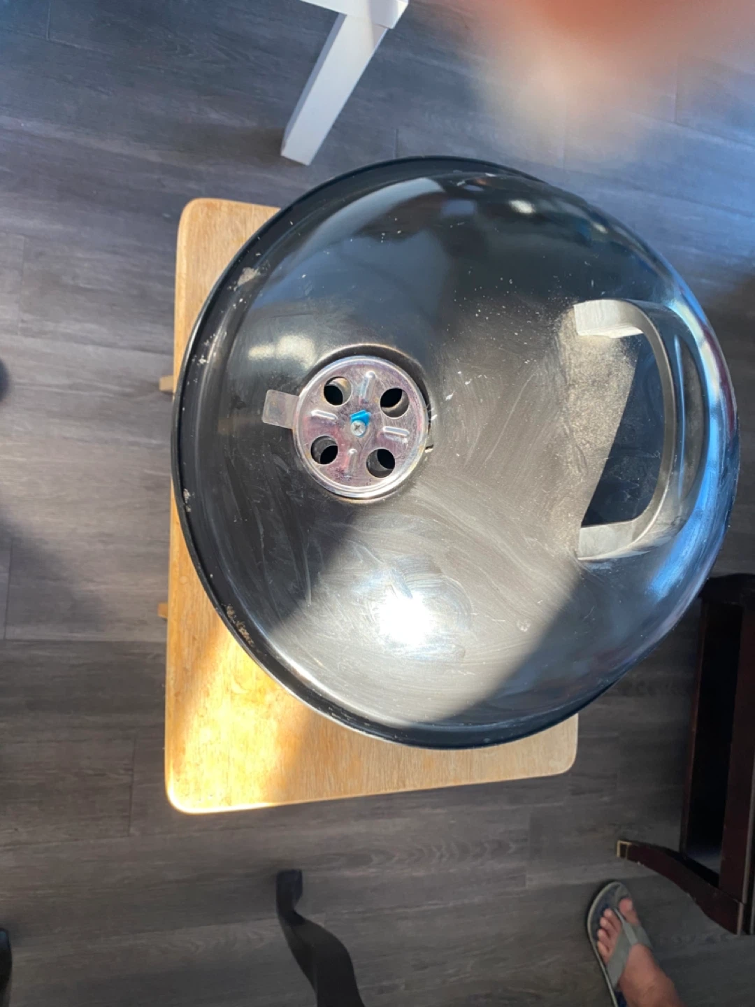 Portable BBQ with charcoal briquettes and charcoal lighter
