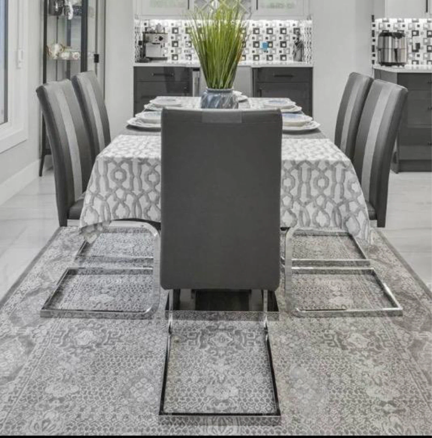 Glass dining table with 6 chairs including 6 chair covers