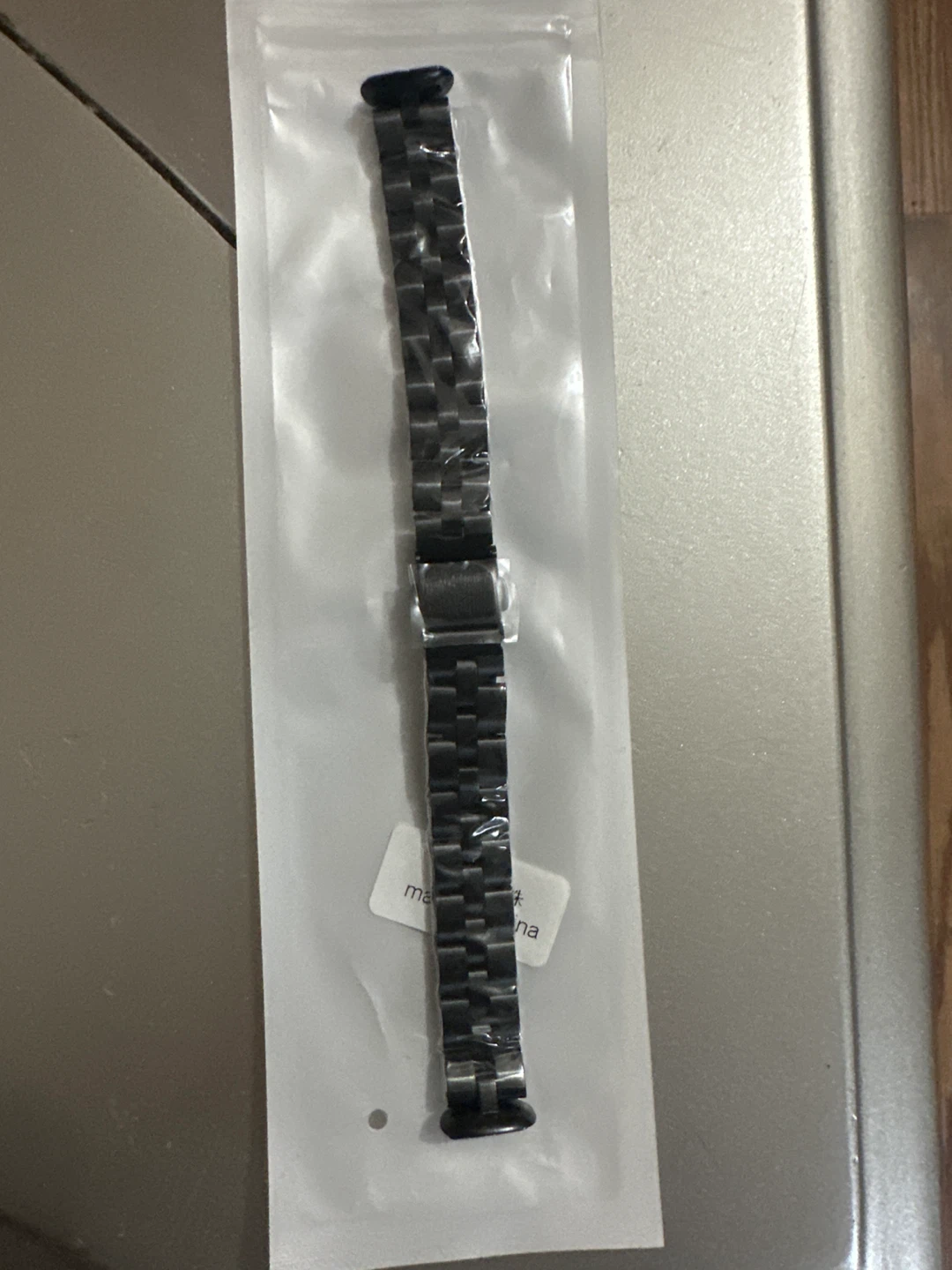 Black stainless steel Fitbit Luxe band