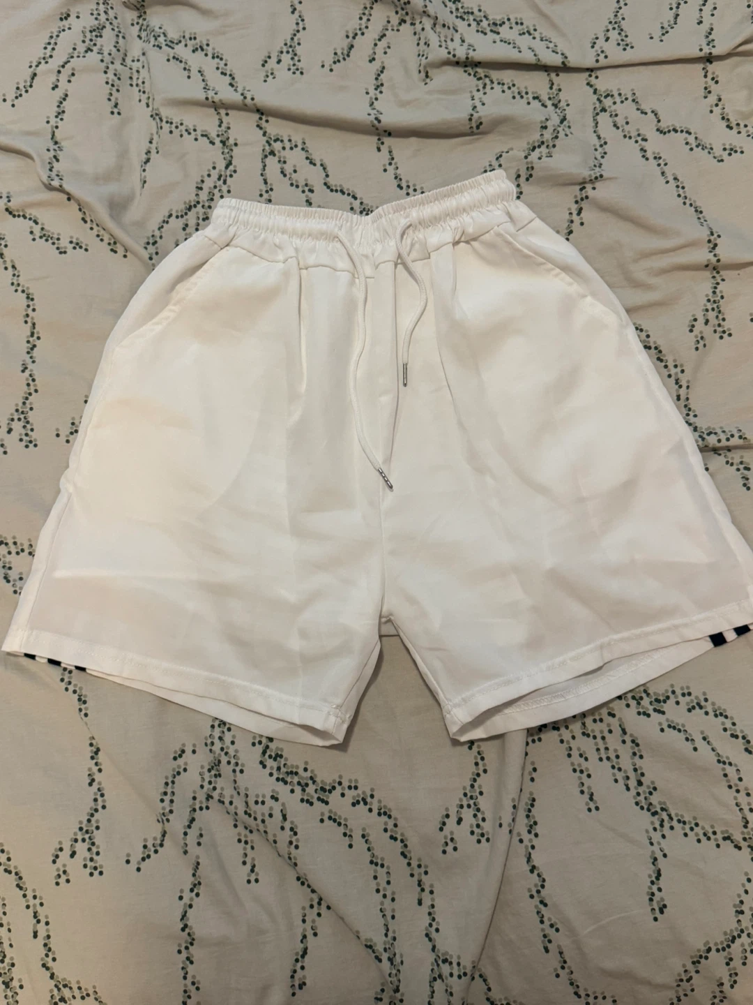 White Athletic Shorts with Black Stripes