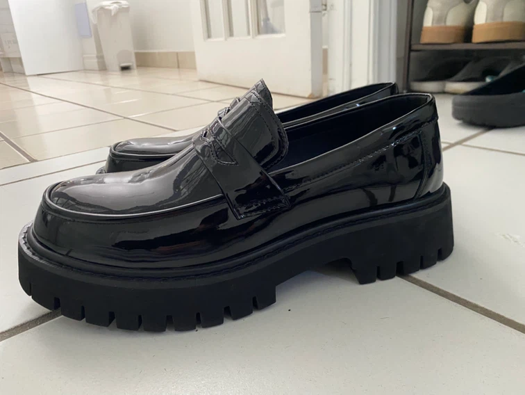 Black patent loafers with chunky soles