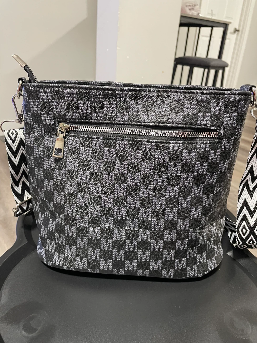 Black crossbody shoulder bag with 'M' pattern - photo 2