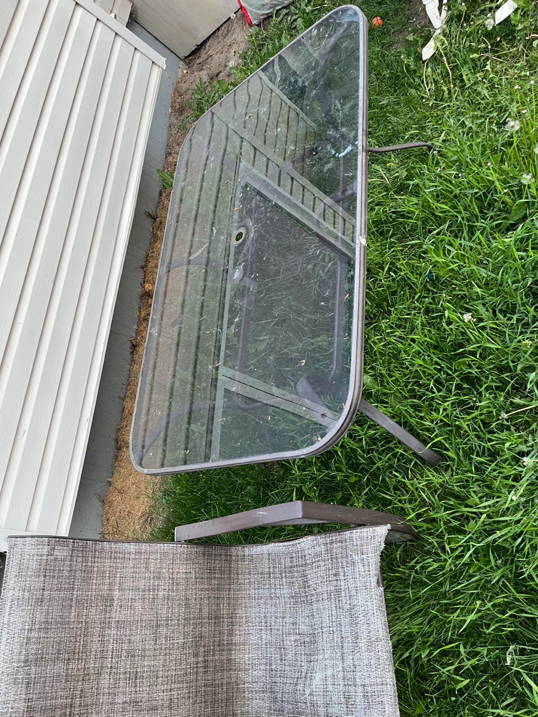 Glass top patio table and 2 chairs