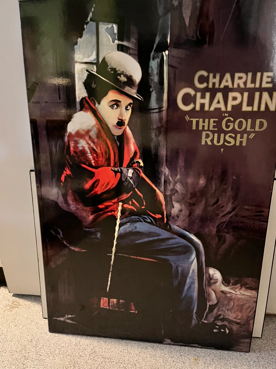 Charlie Chaplin The Gold Rush Movie Poster on black plaque