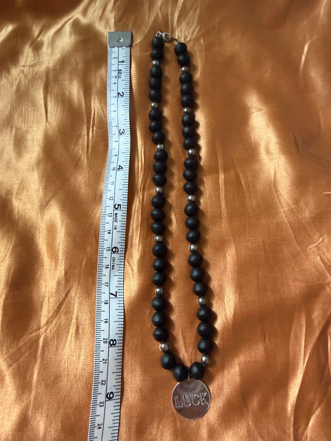 Black and Sterling Silver Beaded Necklace with "LUCK" Charm