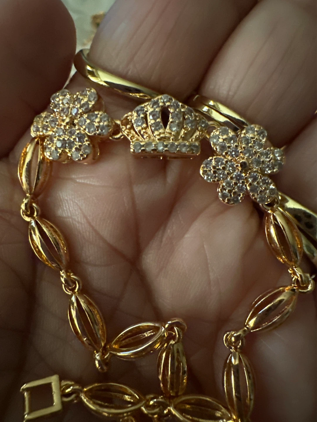 Gold-tone Bracelet with Flower and Crown Charms - photo 2