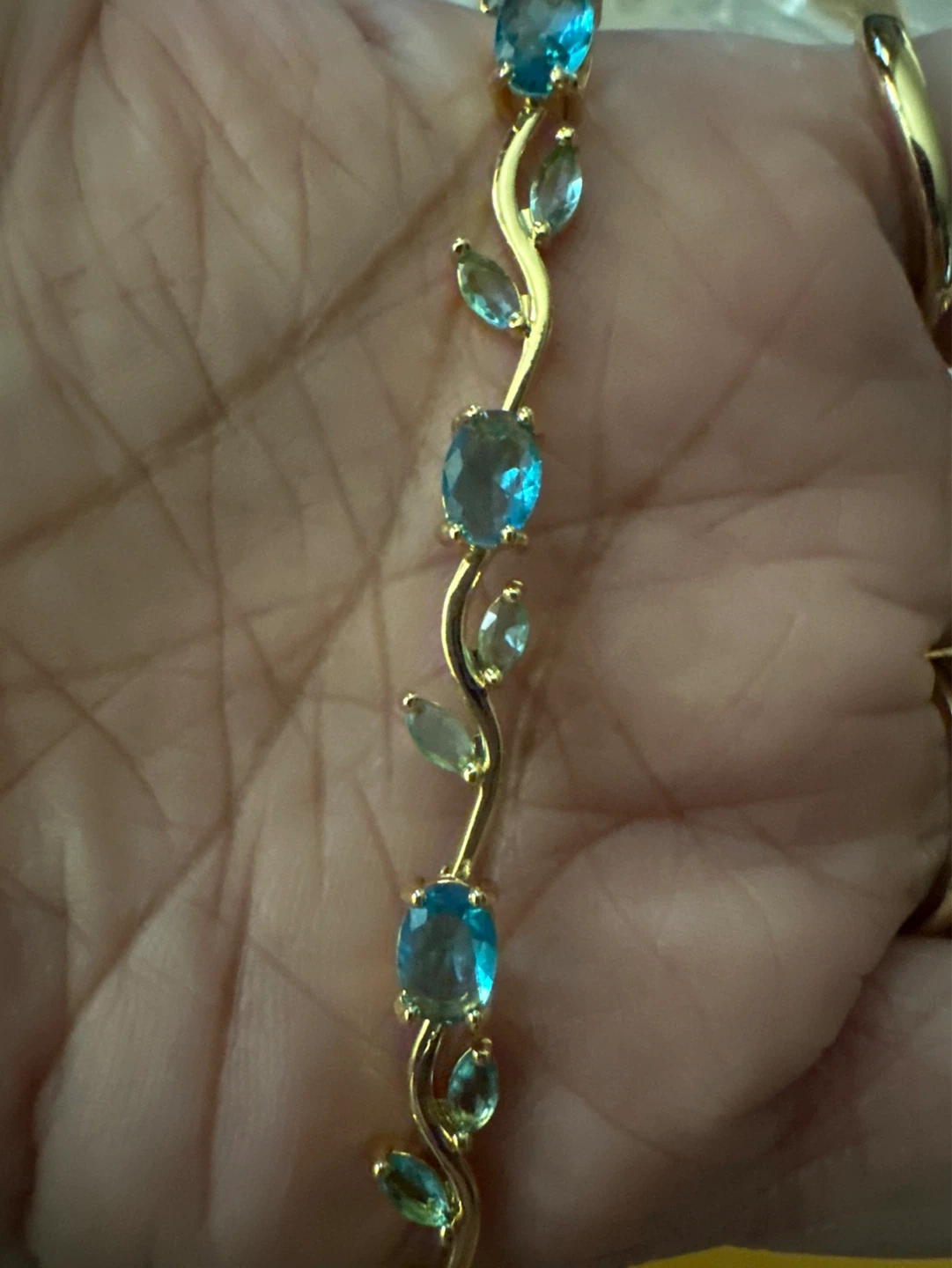 Gold Tone Bracelet with Blue Gemstones