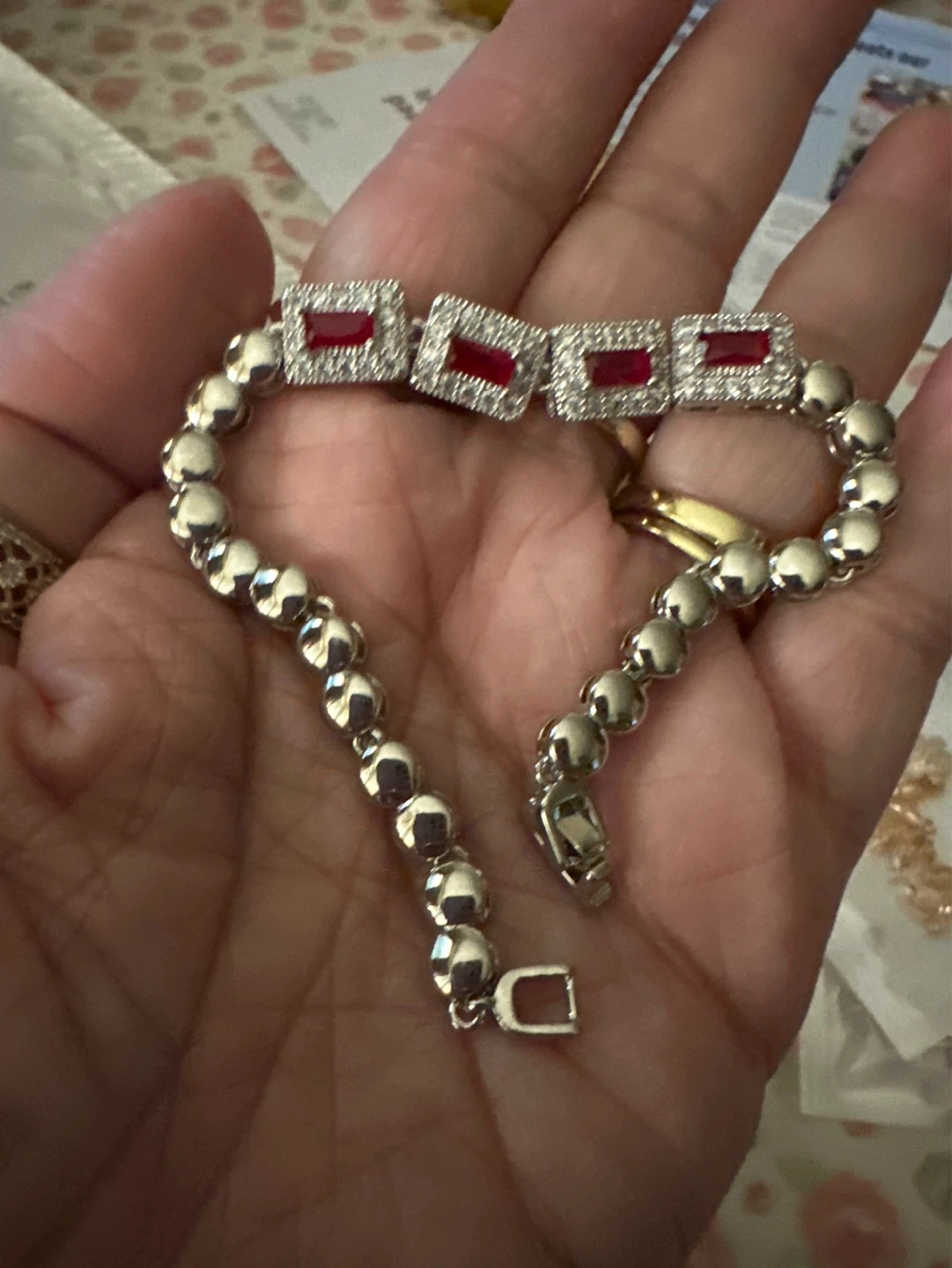 Silver Tone Bracelet with Red Stones