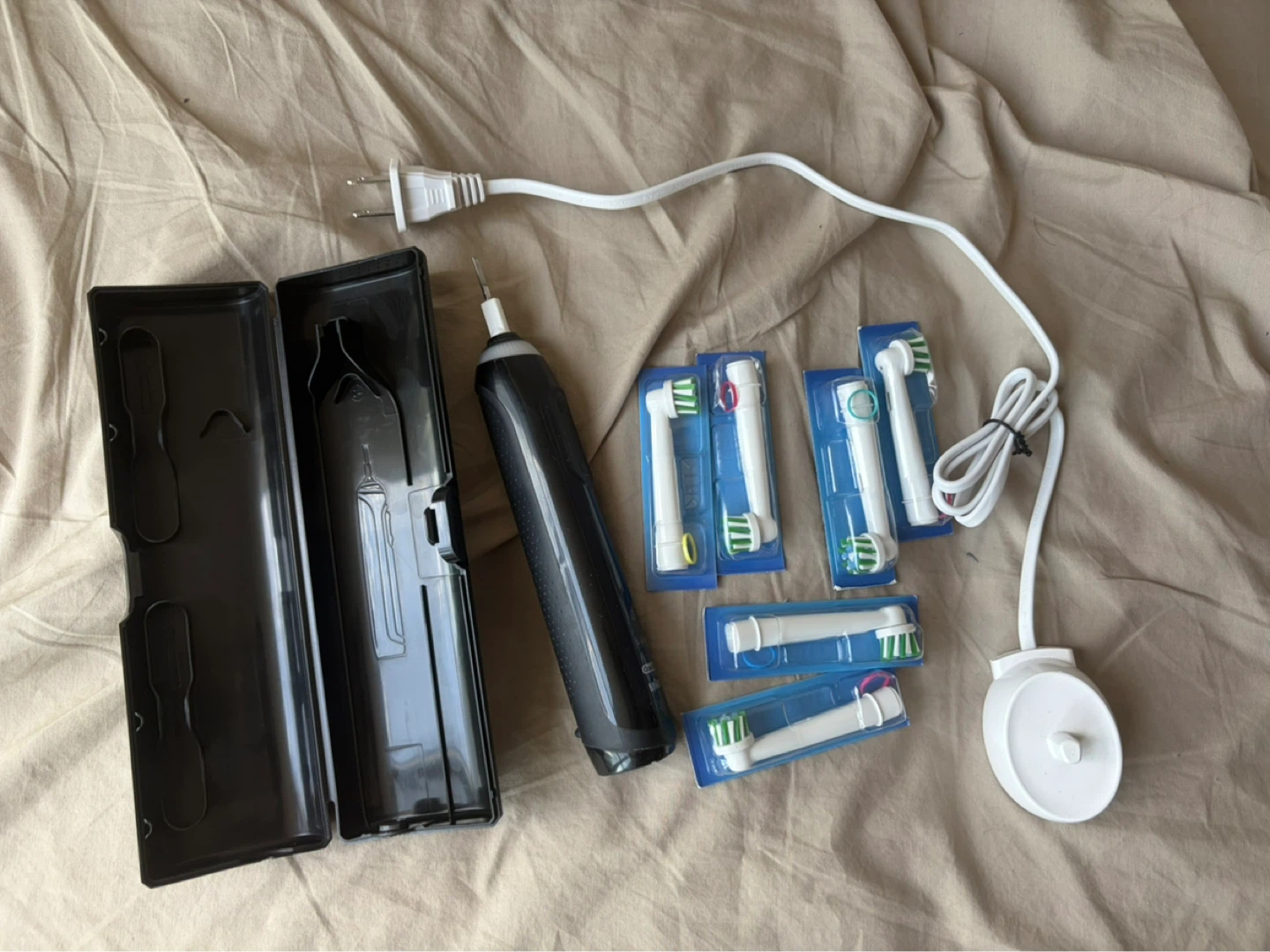 Oral-B Electric Toothbrush with 6 Heads & Travel Case