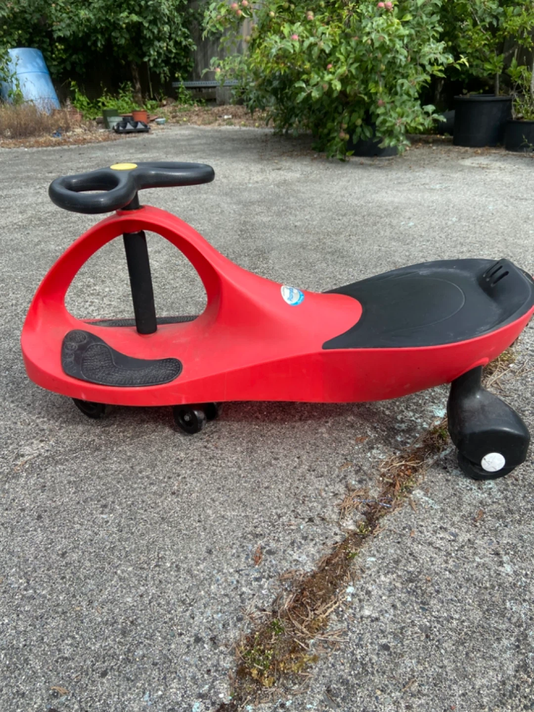 Red and Black Ride-On Wiggle Car