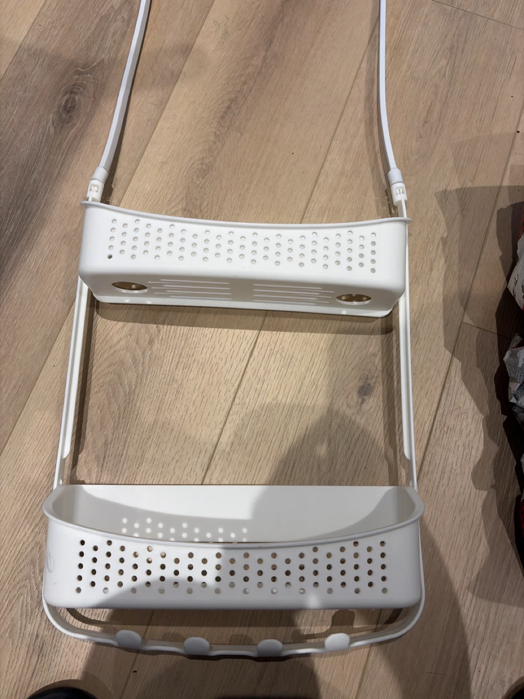 White two-tier hanging shower caddy