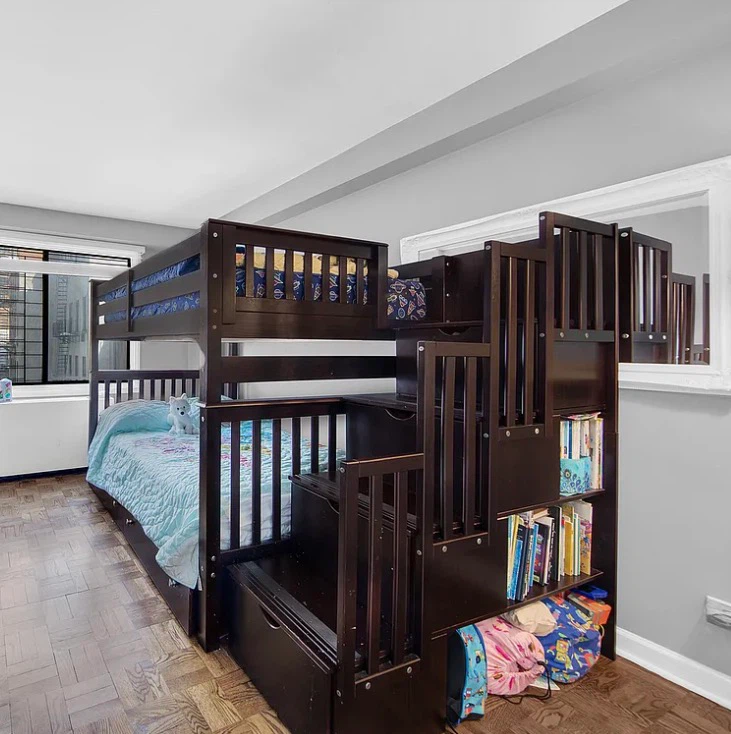 Full over full bunk bed with storage stairs