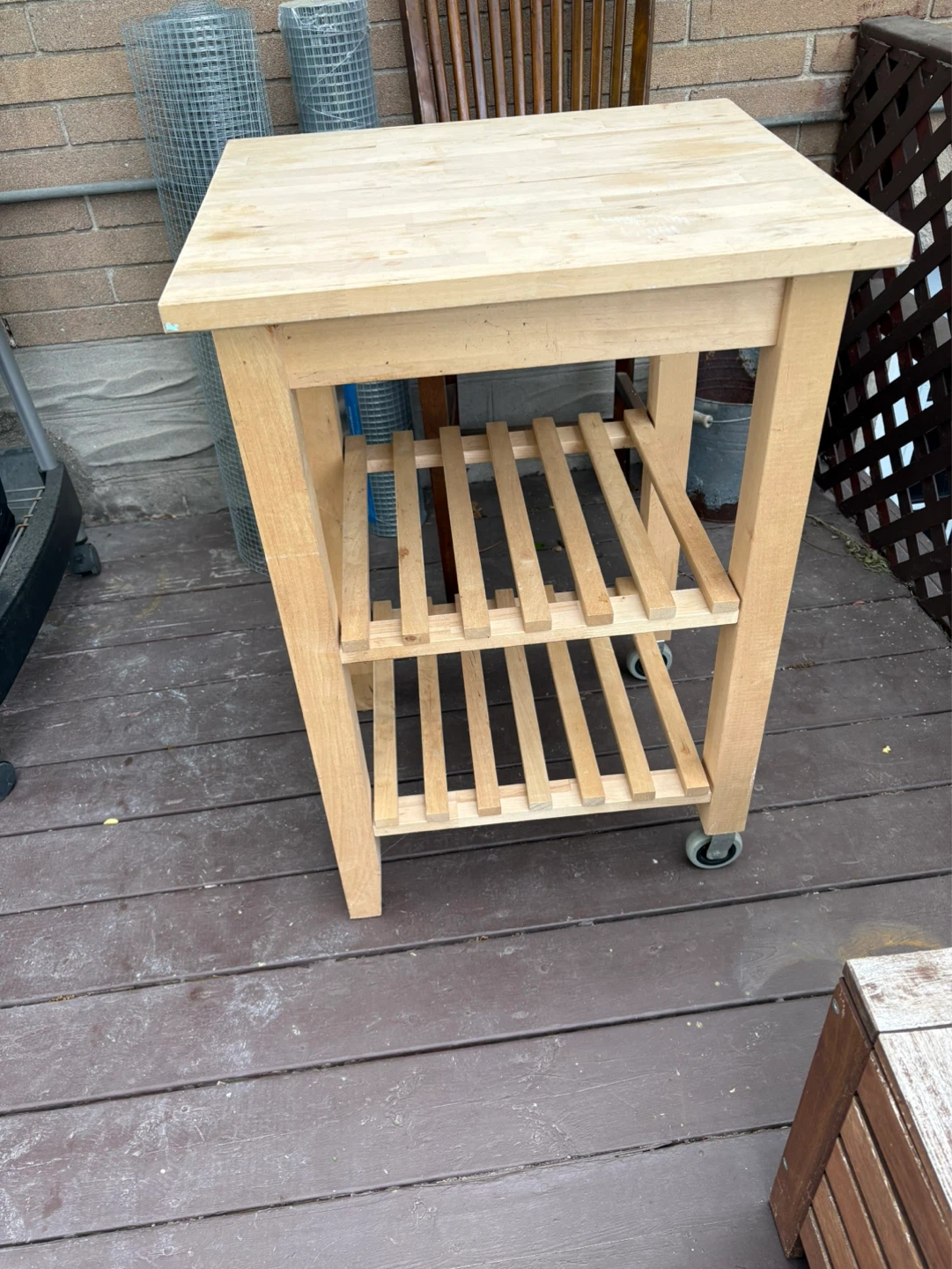 Wood table with wheels. Portable.
