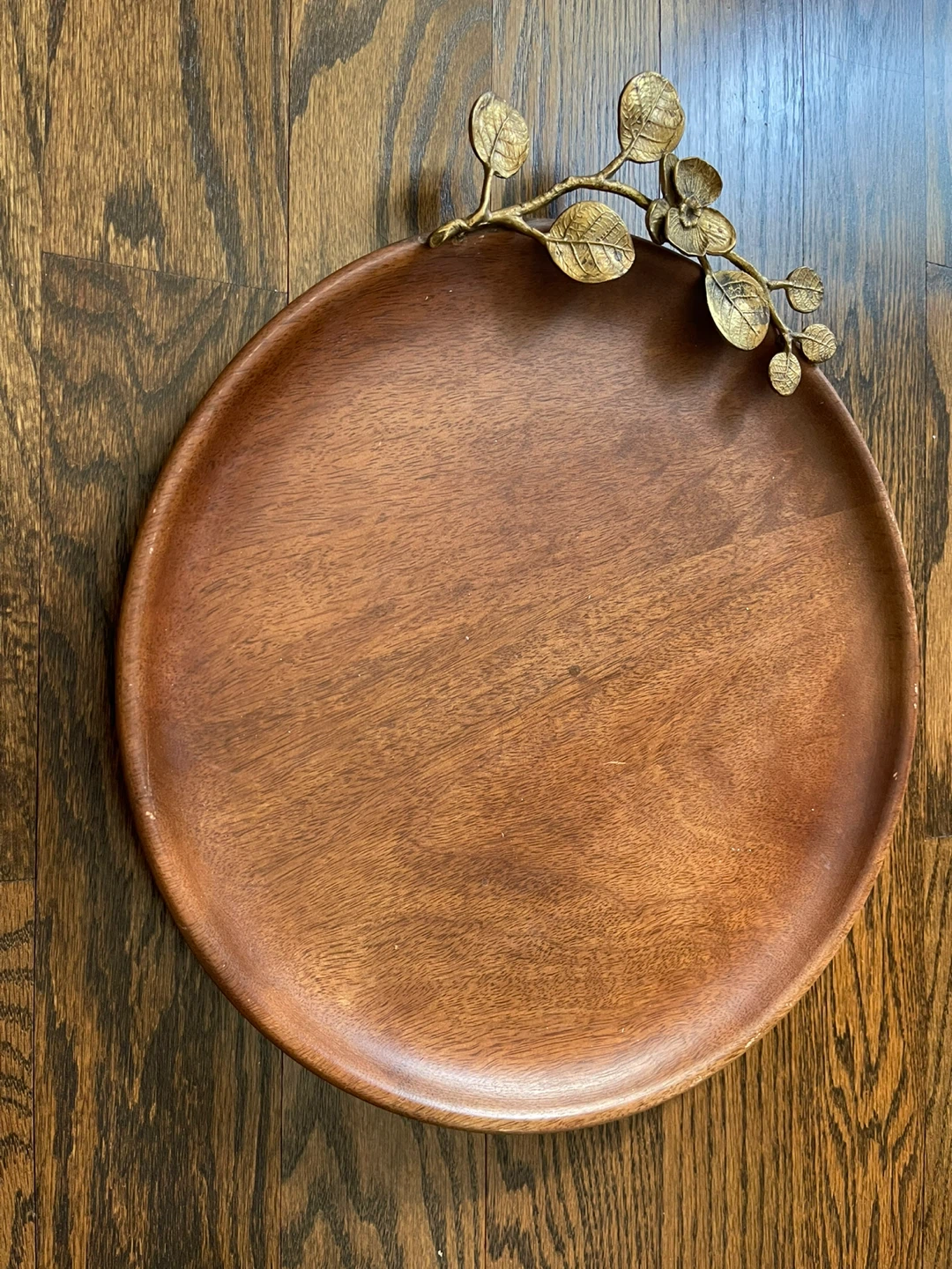 Wooden serving tray with decorative branch accent