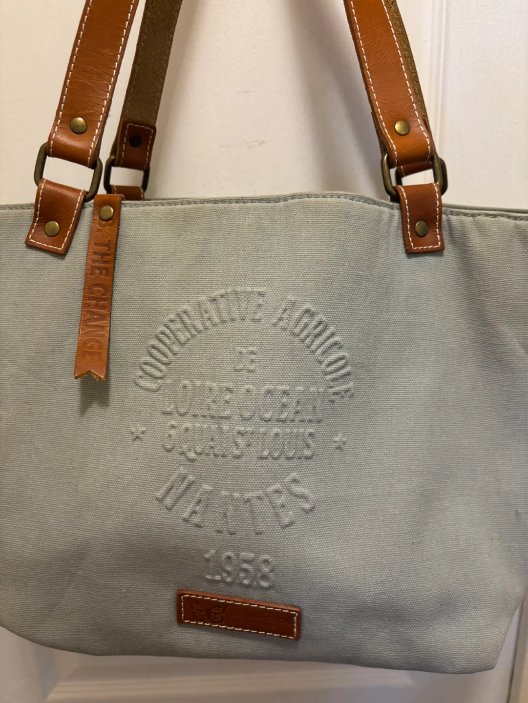 Canvas tote bag with leather accents