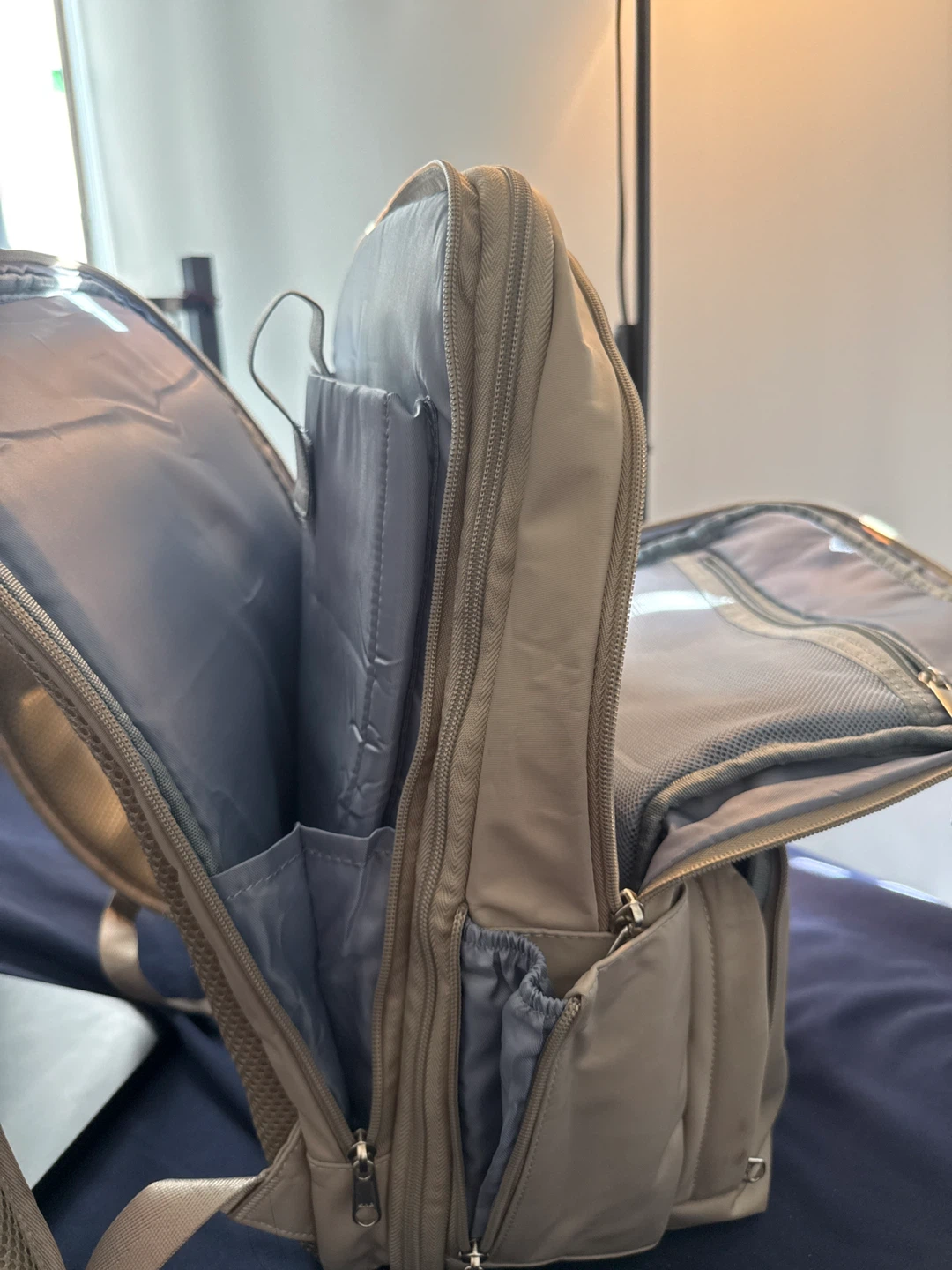 Tan Backpack with vaccum bag attached