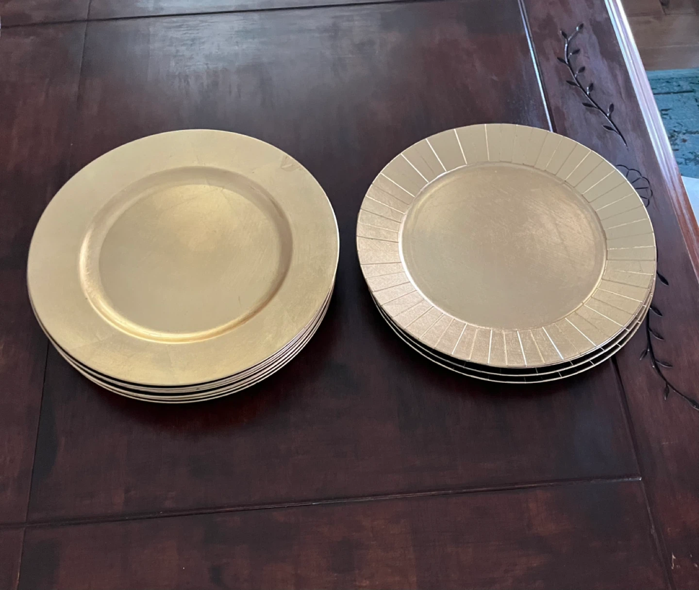 2 sets 1 of 9 and 1 set is 4 Gold Charger Plates
