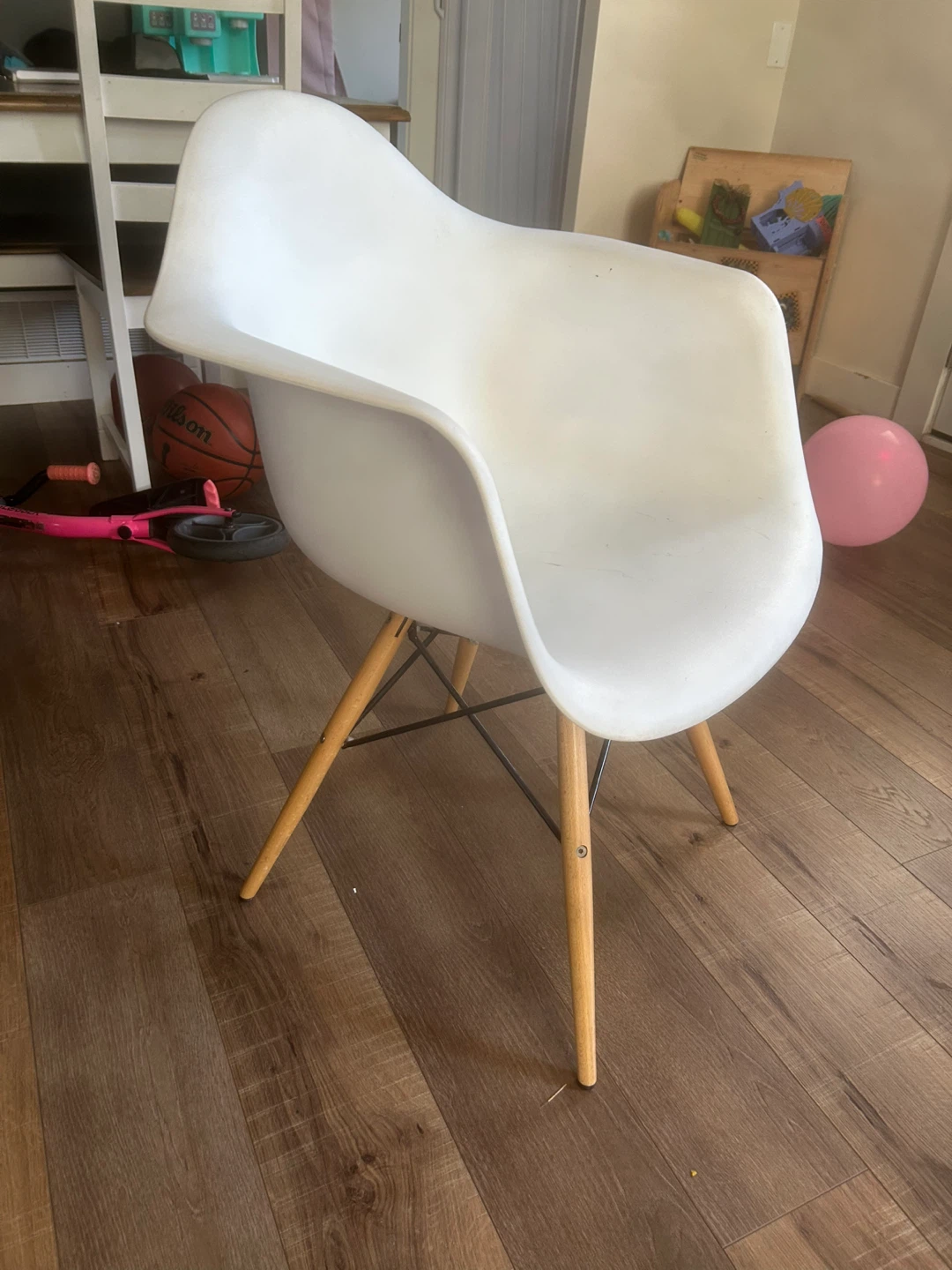 White Molded Plastic Accent Chair with Wood Legs