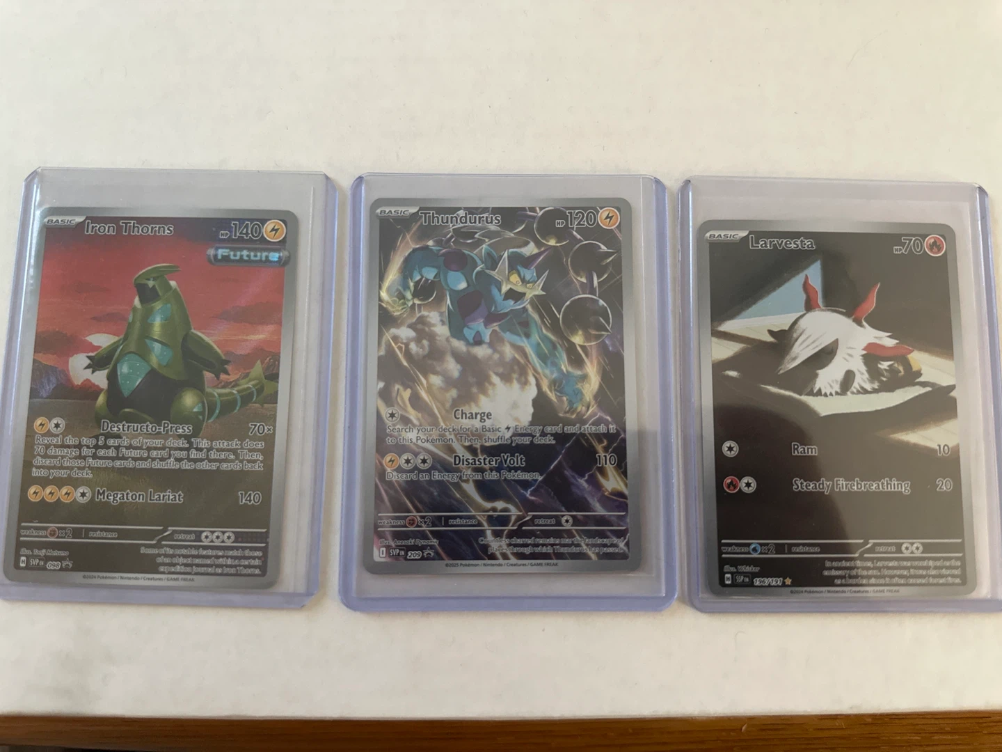 Pokemon Trading Cards: Iron Thorns, Thundurus, and Larvesta