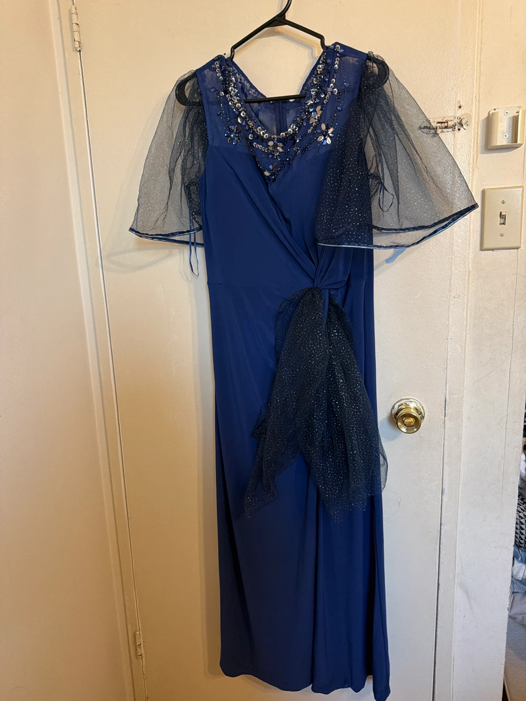 Blue formal dress with sparkly sleeves