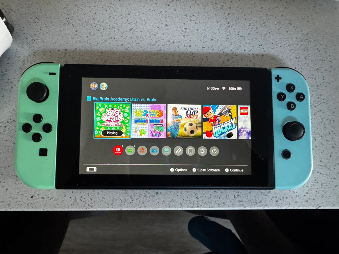Nintendo Switch Console with Games and Controllers