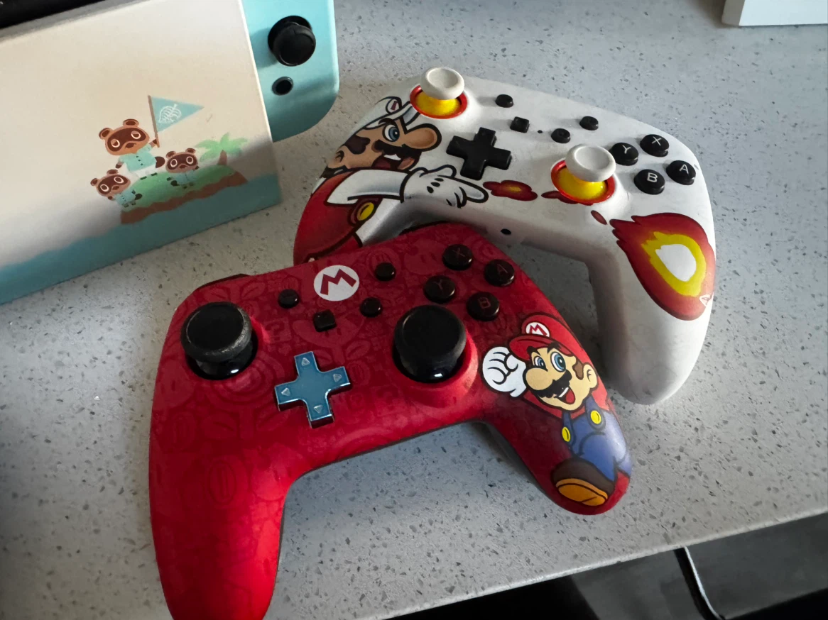 Nintendo Switch Console with Games and Controllers - photo 2