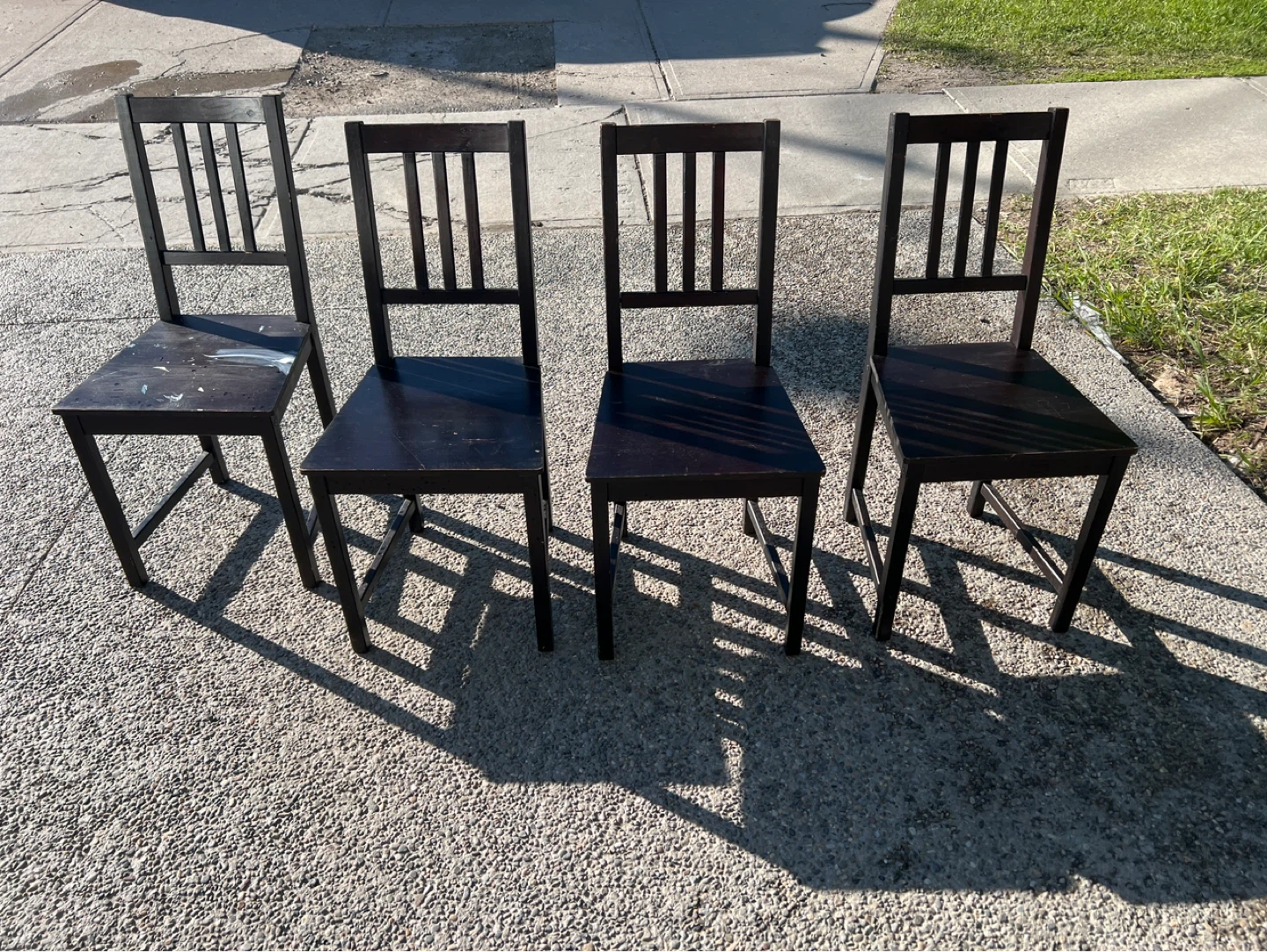 Set of 4 Black Wooden Dining Chairs and a white table