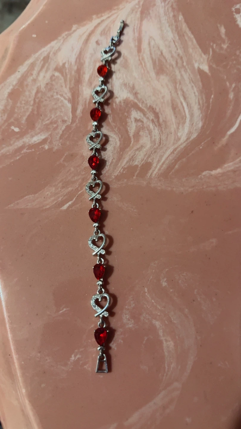 Silver Tone Heart Bracelet with Red Gems