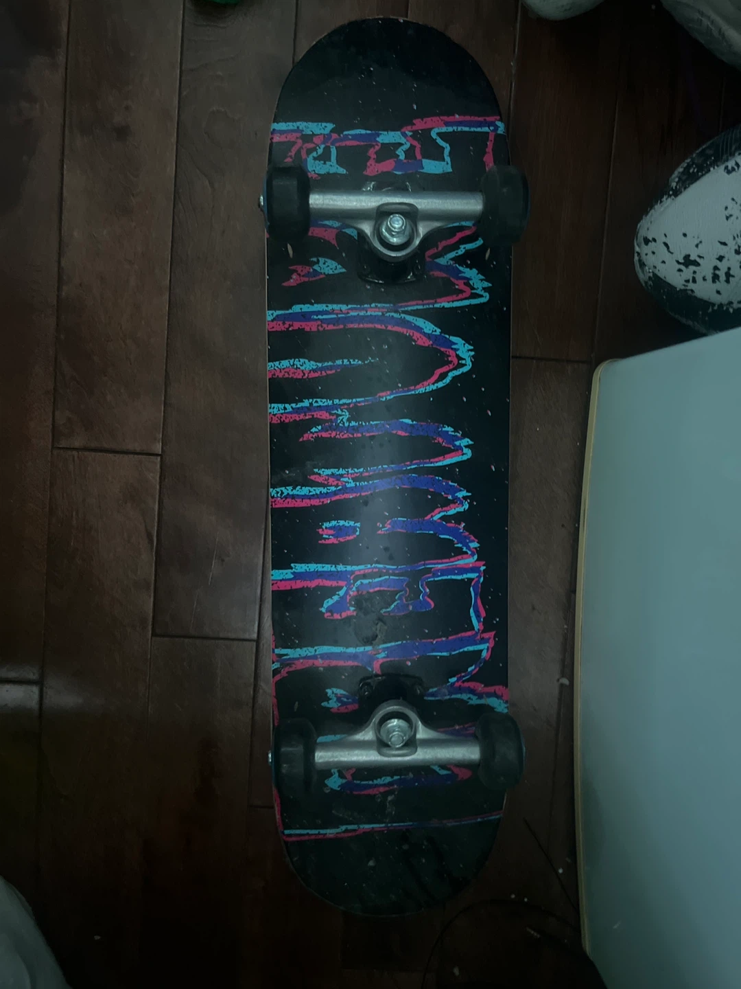 Skateboard with colourful graphic design