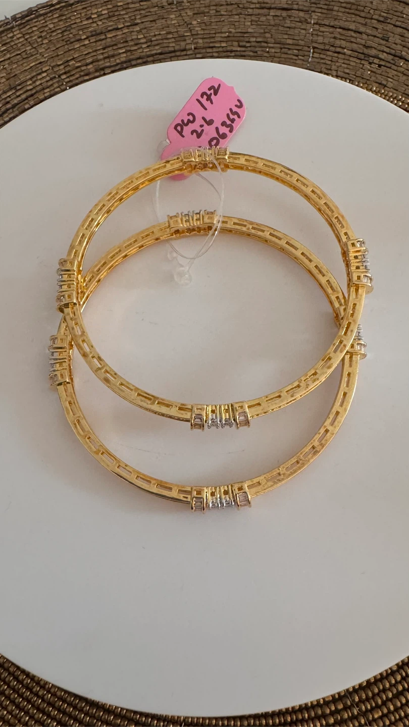 AD gold bangles