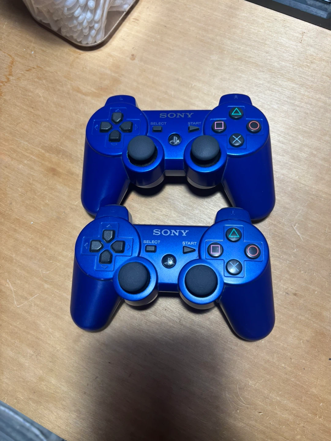 2 Blue Sony ps3 Controllers