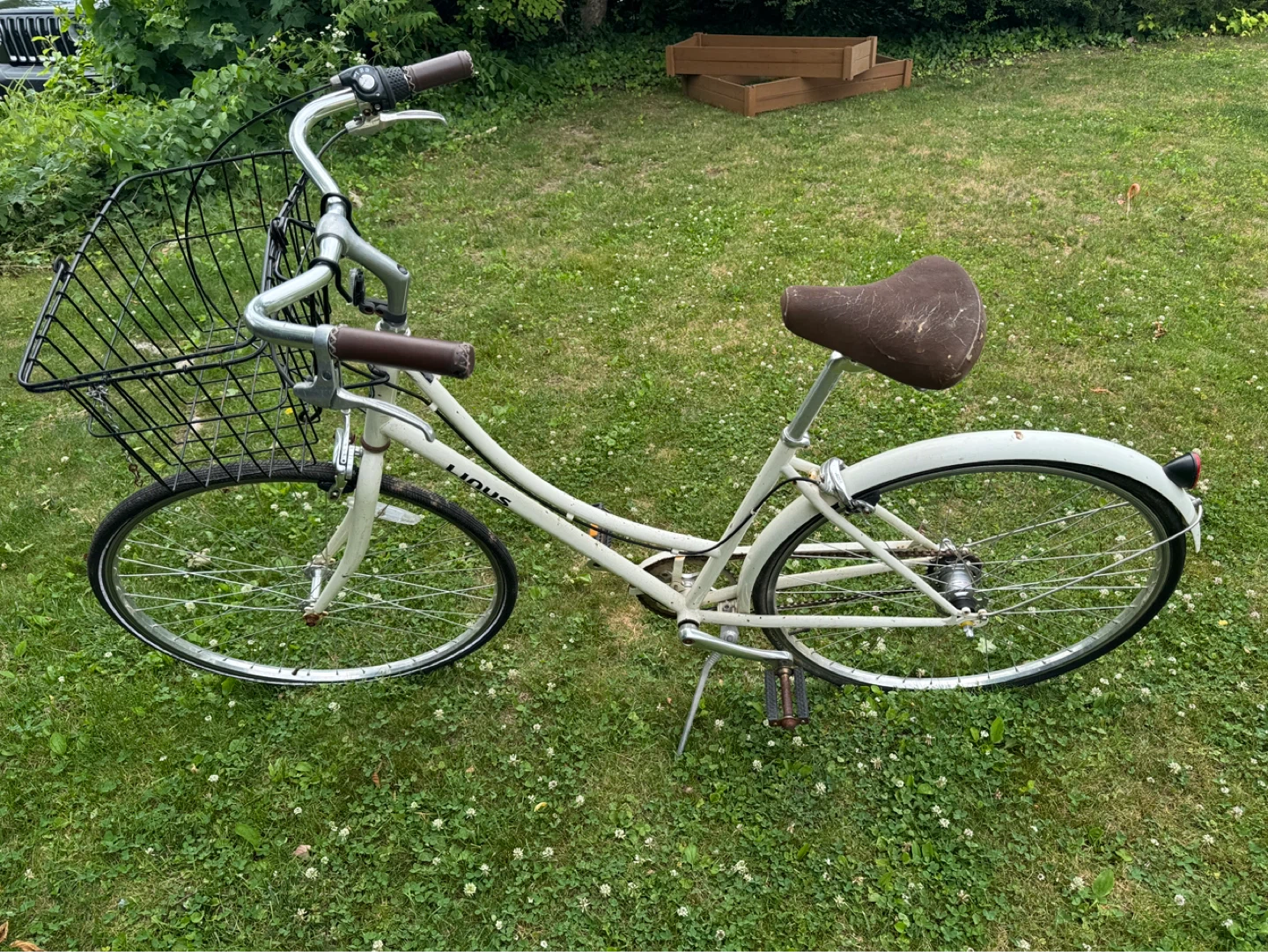 Linus Dutch-style step-through bicycle with basket