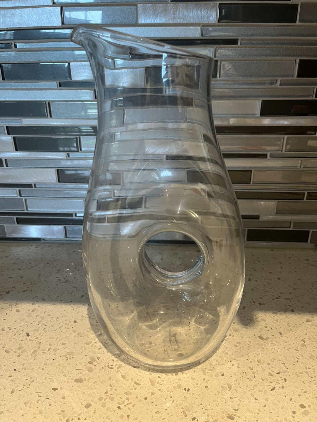 Clear Glass Pitcher with Unique Hole Design