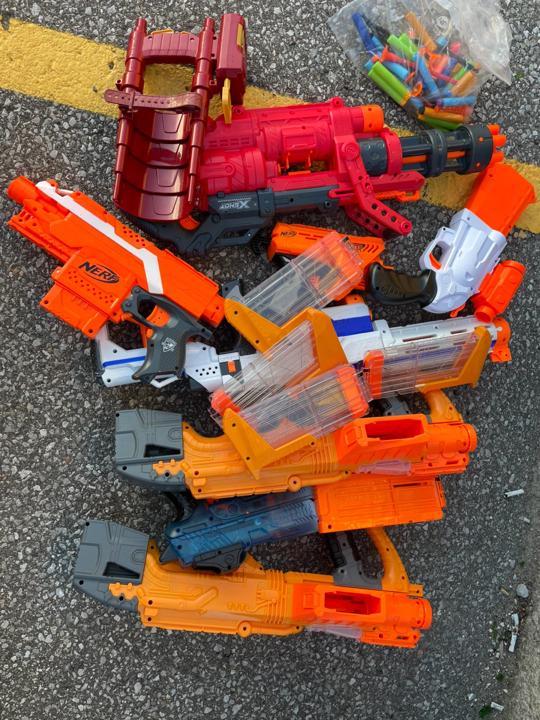 Assorted Nerf Blasters and Accessories