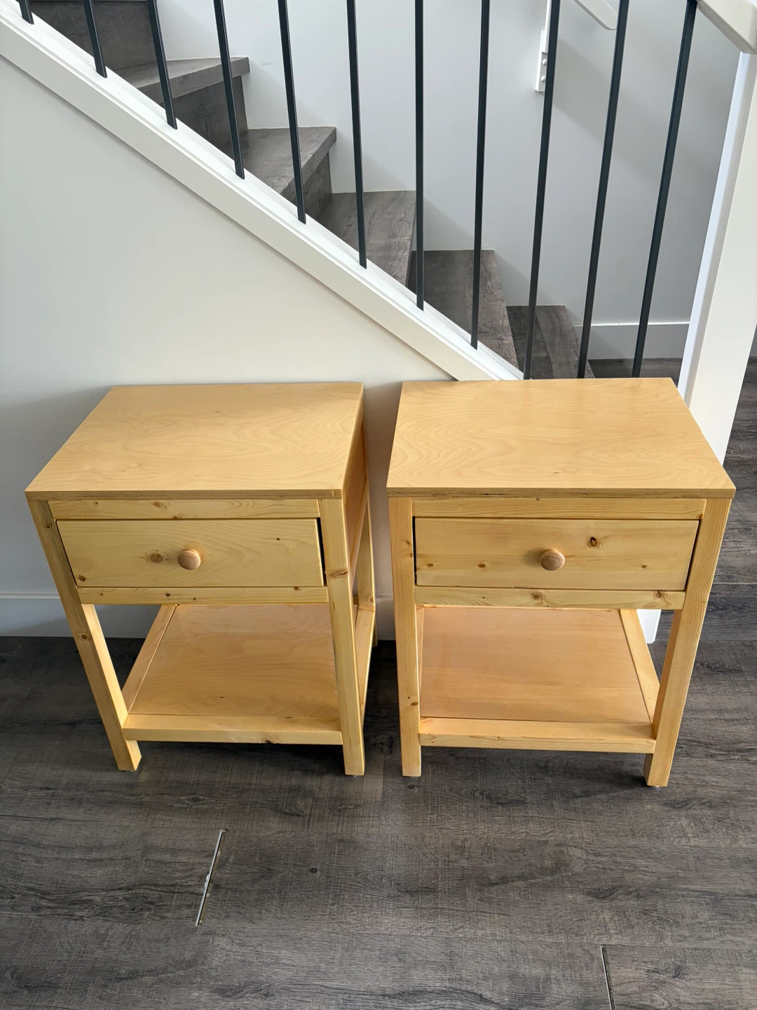 pair of wooden nightstands