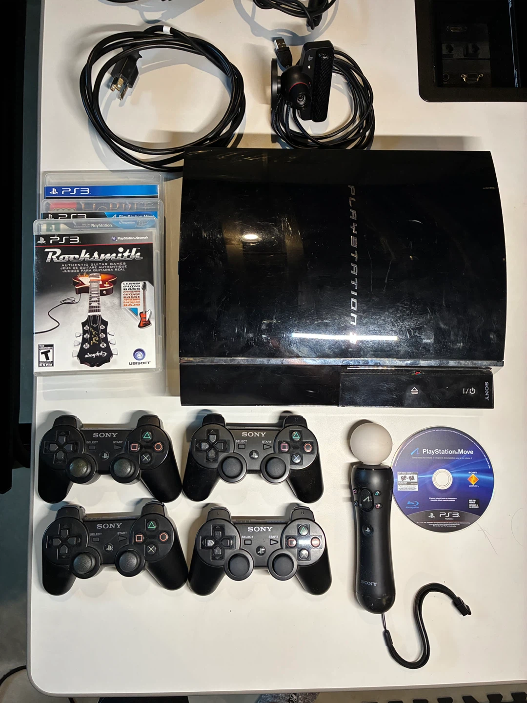 PlayStation 3 Console Bundle with 4 Controllers and Games