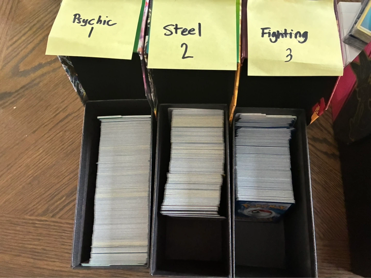 Pokémon ETB boxes with common cards
